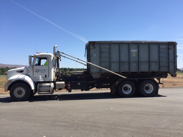 Yakima Waste Systems roll off truck.